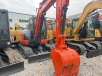 Kubota KX165 d'occasion en bon état, moteur puissant de 40,4 kW, capacité de la benne de 0,25 m³, machine multifonctionnelle