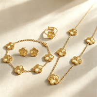 Vente en gros de bijoux en acier inoxydable multicolores, ensemble de 4 pièces, collier, boucles d'oreilles, bracelet, bague, cadeau pour femme, petite amie