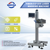 Encodeur de gravure laser UV CO2 industriel à fibre optique volante avec autofocus pour ligne de production en ligne de tuyaux PVC, PPR, câbles, métaux et non-métaux