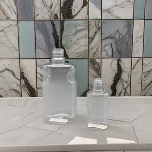 Chất Lượng Cao <span class=keywords><strong>65Ml</strong></span> 330Ml Mini Hình Dạng Rượu Phẳng Chai Pet 2Oz 11Oz Chai Nhựa Trong Suốt Với Bơm - Product Image 5