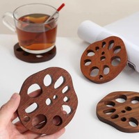 Vente en gros de sous-verres en forme de racine de lotus en bois d'apparence de haut niveau pour l'isolation de bureau