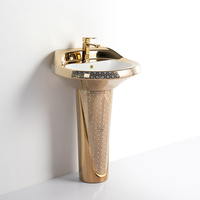 Ensemble de toilette moderne monobloc en céramique dorée facile à nettoyer surface lisse cuvette de toilette plaquée or avec colonne lavabo