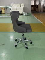 Chaise de bureau pivotante moderne en similicuir avec dossier en tissu, hauteur réglable, base en acier et accoudoirs fixes à réglage manuel
