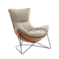 Fauteuil à bascule simple et moderne en métal pour balcon et salon, idéal pour les loisirs estivaux
