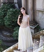 Robe de soirée longue évasée Nicecover, col halter, ornée de perles et de strass brillants, couleur champagne, idéale pour les banquets et mariages – Nouvelle collection très prisée