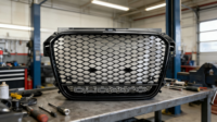 Accessoire de mise à niveau professionnel en plastique pour Audi A1 2013-2015 : Grille S1 avec cadre noir et logo électroplaqué