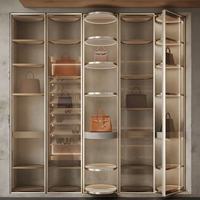 Automatische 360° Rotierende LED-Beleuchtung Vitrine für Handtaschen Moderne Einzelhandels-Ausstellungsraum-Präsentation Aluminiumlegierungsrahmen Maßgefertigte Größe Taschen-Display