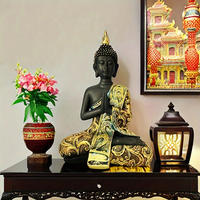 Thailändische Zen-Buddhismus Buddha-Statue in Schwarz-Gold Harz Handbemalte Kunsthandwerk-Skulptur für Heimdekoration Religiöser Stil Geschenk