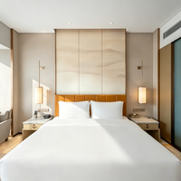 Ensemble de meubles modernes pour chambre d'hôtel : canapé de salon, cadre de lit, table, fauteuil de loisirs en cuir, design modulaire robuste