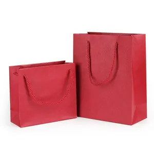 Custom Eco-friendly popular size red Paper Gift Bag with Ribbon twist Handle for boutique