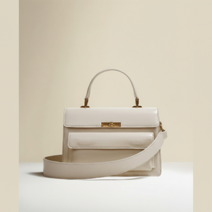 Sac à main crème. Design élégant et structuré avec une large poche avant. Disponible aux prix de gros - Product Image 1