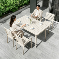 Ensemble de table et chaises de salle à manger d'extérieur en aluminium extensible moderne avec chaises empilables, résistant aux intempéries et antirouille, pour jardin et villa