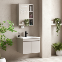 Petite vanité de salle de bain de luxe avec miroir LED, lavabo en céramique mural, design moderne pour appartement