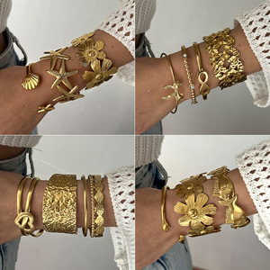 Brazalete recortado de vanguardia SZ118-Brazalete asimétrico de acero inoxidable con perforaciones geométricas para apilamiento de bordes urbanos - Product Image 2