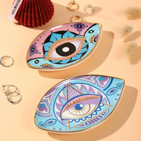 Assiette en céramique de luxe avec motif œil maléfique, design créatif, décorations de table pour mariage et maison, plat à bijoux