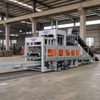 Machine de fabrication de blocs creux entièrement automatique, ligne de production hydraulique PLC à vibration pour pavés et bordures en béton QT18-15S