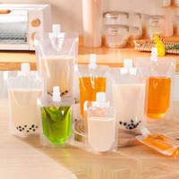 Vente en gros Sacs pochette à bec en plastique transparent pour l'eau, le café, les boissons, le jus de fruit Sac debout Sac à bec verseur