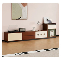 Meuble TV de style Mid-Century, armoire sans poignée à blocs de couleur avec décor rond évidé, tiroirs mixtes et rangement fermé pour appareils multimédias
