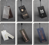 Étiquette volante en plastique transparent imprimé de logo personnalisé Étiquettes en papier UV avec point oscillant en relief Étiquette volante en papier avec ficelle pour vêtement