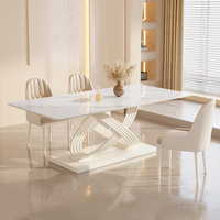 Table de salle à manger de mariage blanche extensible rectangulaire de luxe avec plateau en pierre frittée et base sculpturale moderne pour hôtel et salle de banquet – Vente en gros