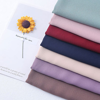Tissu pour peignoirs de Dubaï en polyester tissé de couleur unie, crêpe de chine, tissu crêpe de mousse abaya pour vêtement doux pour femmes