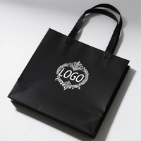 Sacs à provisions de luxe avec logo personnalisé estampage de feuille d'argent ruban de sacs en carton noir écologique pour des promotions personnalisées votre