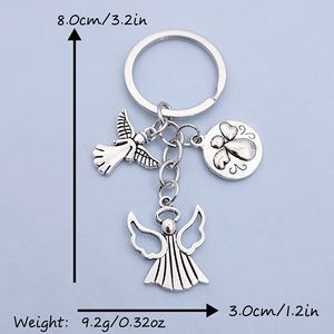 <span class=keywords><strong>3D</strong></span> Vàng Đôi Cánh Thiên Thần Người Giám Hộ Handmade Kẽm Hợp Kim Carabiner Keychain Dập Nổi In Ấn-Mặt Dây Chuyền Thanh Lịch Keyring Cho Phụ Nữ Trẻ Em - Product Image 5