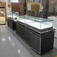 Comptoir de présentation de bijoux moderne, vitrine en verre avec éclairage LED, table de présentation sur mesure en acier inoxydable pour bijouterie