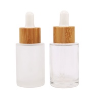 Flacon compte-gouttes rond de luxe en verre de 30 ml avec bouchon à vis en bambou, surface mate, pour cosmétiques et collyres