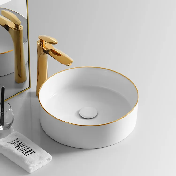 Lavabo redondo de cerámica para baño, color dorado y blanco, lavabo artístico