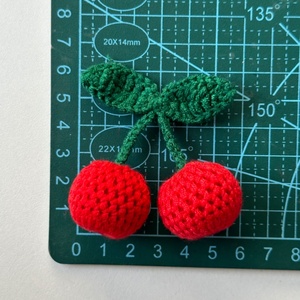 Accessoires faits main à motif cerise : bonnets tricotés, écharpes, chaussures, chaussettes, coques de téléphone, porte-clés – Doux et ornés de fleurs artificielles - Product Image 3