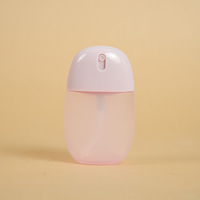 Flacon pulvérisateur en plastique de 50 ml en forme de capsule, couleur personnalisée, portable pour les voyages