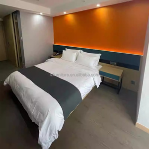 Ensembles de meubles de chambre d'hôtel modernes sur mesure à bas prix, avec lit en bois, table de chevet, armoire, meuble TV et bureau pour hôtel 3 étoiles - Product Image 1