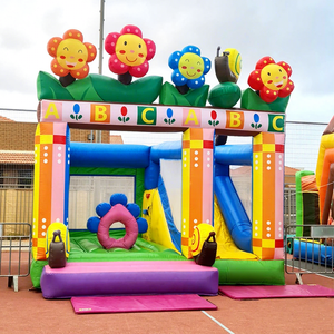 Castillo inflable comercial de calidad para niños, con diseño de jardín de flores, con tobogán y zona de brincos. - Product Image 1
