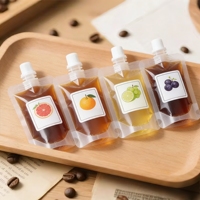 Pochettes transparentes personnalisées avec bec verseur et autocollant pour jus d'orange et cola, petite capacité, vente en gros