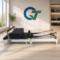 Machine de Pilates pliable en aluminium durable avec design portable et coffret en bois pour usage domestique et en studio