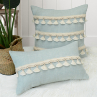 Housse de coussin texturée à rayures tuftées de style bohème moderne 2024 avec pompons pour la maison et l'hôtellerie, personnalisable