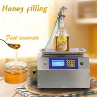 Machine de remplissage quantitative à pompe péristaltique pour liquides, sauces, huiles, boissons, avec contrôle numérique automatique