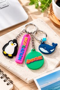 Ensemble de porte-clés mignons en PVC 3D avec pingouin, baleine et étiquettes d'aventure inspirantes - Product Image 4