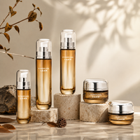 Bouteilles et pots en verre cylindriques transparents à bouchon arrondi avec couleurs de logo personnalisées pour emballages de soins de la peau, contenants en vrac de 30g, 50g, 40ml, 100ml, 120ml