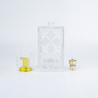Flacon de parfum vide en verre de 100 ml avec pulvérisateur et diffuseur à bâtonnets pour la circulation en gros de cosmétiques et le commerce mondial