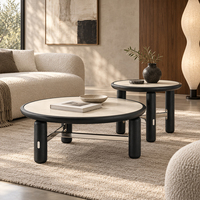 Ensemble de tables basses rondes Stretcher Brace avec dessus en os, bords noirs et pieds courts pour salons lumineux et appartements compacts