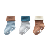 Vente en gros de chaussettes antidérapantes respirantes pour bébés, chaussettes antidérapantes en coton colorées pour nouveau-nés
