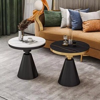Table basse multifonctionnelle moderne minimaliste de luxe léger, avec structure en métal et plateau en pierre artificielle, pour salon