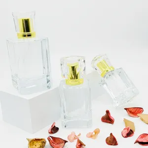 Botol parfum kaca elegan bening 30ml/50ml/100ml, botol Atomizer dengan tutup mahkota untuk parfum wanita