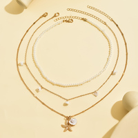 Collier pendentif YEHHY en fausses perles, pampilles, pierres concassées, étoiles de mer et coquillages, perles, multicouche, pour femme, idéal pour l'été et la plage