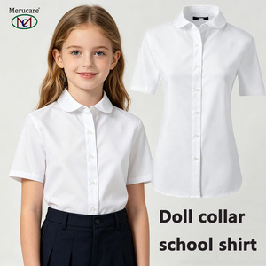 Chemisier moderne blanc/bleu à manches courtes et col Peter Pan pour filles, uniforme scolaire personnalisé pour l'école primaire et la maternelle, vente en gros - Product Image 1
