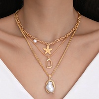 Nouveau collier à pendentif en forme d'étoile de mer et de coquillage en fausse perle océanique irrégulière, 3 pièces, pour femmes, bijoux superposés exquis, accessoires de mode