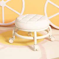 Tabouret à roulettes universel industriel en plastique pour usage domestique, idéal pour le salon ou comme repose-pieds