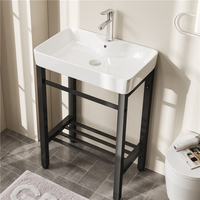 Lavabos de salle de bain simples à utiliser dans les hôtels modernes Lavabo à main en céramique avec support au sol Porte-serviettes